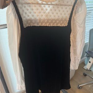 Chic Black Dress with White Lace Detail